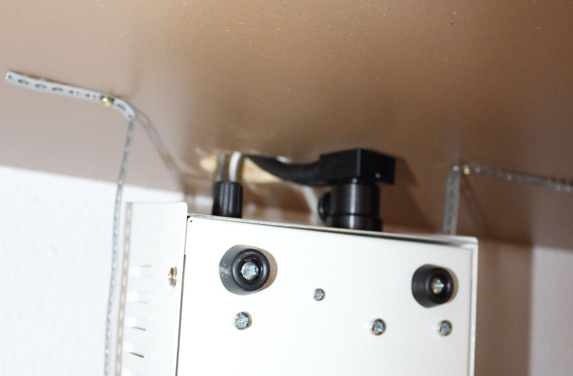 Figure 5. Hanging arrangement of fiber optical illuminator, under the kitchen workplate.